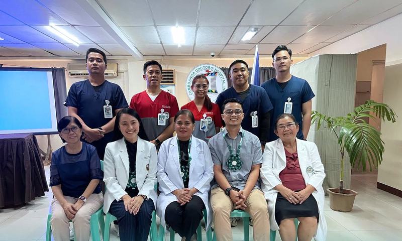 Speakers and rehab staff after ZDH's World Physical Therapy Day lecture in the multipurpose hall.